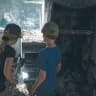 NIR OZ decided to demolish all its 400 damaged buildings and build from scratch, preserving only sporadic reminders of the carnage, to be integrated in a memorial complex. Here, children of the kibbutz visit their destroyed home one last time before.