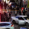 Law enforcement work at the scene after a shooting reportedly involving US Immigration and Customs Enforcement (ICE) officers in the Bronx borough of New York City, US, October 8, 2026.