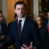 US Senator Jon Ossoff (D-GA) speaks at a press conference following the Democratic weekly policy lunch on Capitol Hill in Washington, D.C., U.S., December 9, 2025. 