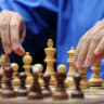 India's Vishwanathan Anand plays against Israel's Boris Gelfand during a tie-break of FIDE World chess championship match in State Tretyakovsky Gallery in Moscow on May 30, 2012.