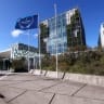 People stand outside the International Criminal Court (ICC) as the United States is considering imposing sanctions as soon as this week against the entire International Criminal Court, in The Hague, Netherlands, September 22, 2025. 