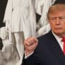 US President Donald Trump gestures at the end of a Columbus Day celebration in the East Room of the White House in Washington, DC, US, October 9, 2026. 