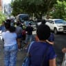 People gather in an open area after an earthquake struck near the southern coast of Panama, in Panama City, Panama, October 9, 2026.