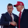 US Defense Secretary Pete Hegseth shakes hands with US President Donald Trump onstage during an event at Sparrows Point Shipyard, in Baltimore County, Maryland, US, October 6, 2026.