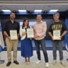 Filmmakers Ariel Orbuch, Roy Danino, and Hagai Gutman, creators of NAZA, The True Story receive ertificates of appreciation from National Public Diplomacy Directorate head Tzipi Hotovely on Thursday, October 8, 2026. 