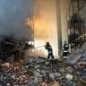 Firefighter work at a site of a destroyed warehouse hit during a Russian drone strike, amid Russia's attack on Ukraine, in Kyiv region, Ukraine, in this handout picture released October 8, 2026