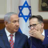 Israeli prime minister Benjamin Netanyahu (L) speaks with Cabinet secretary Tzachi Braverman during the weekly government conference at the Prime Minister's Office in Jerusalem on June 17, 2018