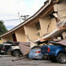 This view shows a collapsed building and damaged cars after a 7.6-magnitude earthquake struck the country, in Penonome, Panama, on October 9, 2026. 