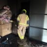 Firefighter at scene of fatal fire in the Golan, October 11, 2026.