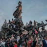Protestors that authorities have said nationwide number in the hundreds of thousands and demonstrating against what they call an overcrowded, ill-equipped and understaffed education system, gather around the Monument à la République in the center of the Place de la République on October 4, 2026.