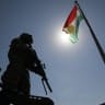 Kurdish Peshmerga fighters take position on the Qarachogh Mountain in the Makhmur district, about 60 kilometres south of Erbil, capital of Iraq's autonomous northern Kurdish region, on September 30, 2026.