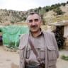 Murat Karayilan co-leader of the Kurdistan Worker's Party (PKK) and leader of the Kurdistan Democratic Confederalism Council (KKK) poses during an interview with AFP in a camp near Arbil in the Sinena mountains, northern Iraq, 11 August 2005.