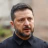 Ukraine's President Volodymyr Zelensky speaks to the media while he visits together with British Foreign Secretary Ed Miliband the site of an apartment building where 22 residents were killed amid Russia's attack on Ukraine, in the Chernihiv region, Ukraine, October 8, 2026. 