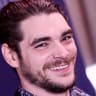 BEVERLY HILLS, CALIFORNIA - SEPTEMBER 30: RJ Mitte attends a screening of "Talking To Strangers" at Fine Arts Theatre on September 30, 2026 in Beverly Hills, California; illustrative