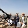 Houthi fighters man machine guns mounted on trucks as they participate in a weaponized protest staged against the US and Israel on November 6, 2025, in Sanaa.