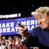 US President Donald Trump points toward supporters at the end of a campaign rally for US Senator Jon Husted (R-OH) and gubernatorial candidate Vivek Ramaswamy in Youngstown, Ohio, US, October 12, 2026