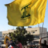 Supporters of Lebanese Shia movement Hezbollah wave flags of the group during a ceremony held to mark the second anniversary of the killing of leader Hassan Nasrallah in a strike by Israel, in Beirut's southern suburbs on September 27, 2026. 