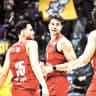 Hapoel Jerusalem forward Yotam Hanochi (center) celebrates with teammates during the Reds’ 92-69 victory over Hapoel Holon. 