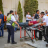 Injured students and teachers arrive at Ziv Medical Center in Safed, northern Israel, following an explosion of suspected unexploded ordnance during a school trip near the Israeli border with Lebanon, October 12, 2026.