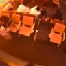 FILE PHOTO: Surveillance footage shows people sitting in a waiting area reacting at the moment of an attack, in a location given as King Khalid International Airport in Riyadh, Saudi Arabia, October 10, 2026, in this frame from a handout video.