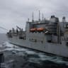 The USS George Washington conducts a replenishment at sea, receiving food and supplies from another vessel in the Arabian Sea, September 14, 2026. The aircraft carrier, capable of carrying more than 5,000 personnel, is enforcing a US naval blockade against Iran.