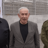 Prime Minister Benjamin Netanyahu, Defense Minister Israel Katz, and the PM's Military Secretary, Maj.-Gen. Guy Markizeno visit the eastern security wall, October 15, 2026.