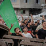 Palestinian boys and men chant and carry a Hamas flag during the funeral procession for commanders Izz al-Din al-Beik and Mohannad Abu al-Foul in Gaza City, Gaza Strip, on September 29, 2026.