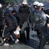 Police detain a demonstrator during a students' protest in Brussels, Belgium, October 17, 2026.