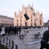 Demonstrators clash with Police during an anti-government protest organized by the Italia in Piazza movement, at Piazza Duomo in Milan, on October 17, 2026. 