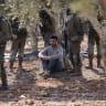 A Palestinian man is detained while attempting to reach his land during the olive harvest on October 17, 2026 in Abu Falah, West Bank. 