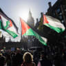  Protesters attend the National March For Palestine on October 10, 2026 in London, England. 