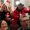 Supporters of the Forever Canadian group, who want Alberta to remain in Canada, wave Canadian flags as they watch the results of a non-binding referendum on Alberta sovereignty in Edmonton, Alberta, Canada October 19, 2026.
