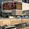 A billboard campaign featuring the faces of Hersh Goldberg-Polin, Eden Yerushalmi, Carmel Gat, Almog Sarusi, Alexander Lobanov, and Ori Danino, seen on Ayalon Highway near Tel Aviv, October 20, 2026