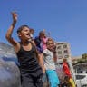 Children gather and play on a water truck in Gaza City, Gaza Strip, on September 23, 2026. The Emergency Committee of the Chambers of Commerce and Industry recently held a protest, warning that shortages of tires, oil, and spare parts are disrupting the operation of these water trucks.