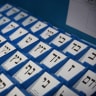 Ballot papers of various political parties are displayed at the Central Elections Committee warehouse in Shoham, ahead of Israel’s upcoming general elections, October 14, 2026