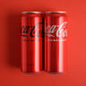 Cans of drink Coca Cola classic and Coca Cola zero.
