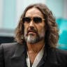 British comedian, actor, podcaster, and media personality, Russell Brand arrives at Southwark Crown Court on October 14, 2026 in London, England.