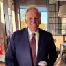 Mike Rogers, Republican candidate for U.S. Senate in Michigan, poses during an interview at a Tim Horton's in Walled Lake, Mich., Oct. 20, 2026.