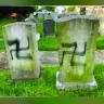 The tombstones defaced with swastikas at the Jewish cemetery in Dunduke, Maryland.