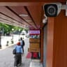 This picture taken on May 5, 2022, shows a CCTV camera installed outside a shop at a market in Srinagar. India has ordered all private businesses in Indian-administered Kashmir to install security cameras.