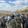 IDF forces detain volunteers with Rabbis for Human Rights in the West Bank village of Nahalin on October 21, 2026. 