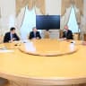 Members of the Russian delegation, including President Vladimir Putin and foreign policy adviser Yuri Ushakov, attend a meeting with US special envoy Steve Witkoff at the Constantine Palace in Saint Petersburg, Russia, October 21, 2026. 