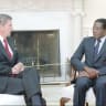 ZIMBABWE PRIME MINISTER Robert Mugabe meets with US president Ronald Reagan in the Oval Office, 1983. 