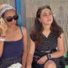 Golda Daphna (right) is seen in the aftermath of being the victim of a terror attack in the West Bank.