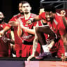 Hapoel Tel Aviv players celebrate on the bench during their 90-81 comeback Euroleague victory over Virtus Bologna in Bulgaria.