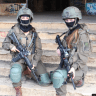 BATTALION 595 intelligence collection soldiers ‘N.’ (left) and ‘R.’ during field operations. The two talked to the ‘Post’ of the challenges of clandestine surveillance missions in Syria, where remaining undetected and maintaining close coordination can be critical to their safety.