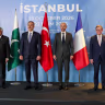 Turkish Foreign Minister Hakan Fidan poses with global government officials before their meeting in Istanbul, Turkey, October 23, 2026.