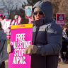 Activists picket US Rep. Haley Stevens' suburban Detroit office to protest her acceptance of campaign funding from AIPAC, in Farmington Hills, Michigan on Nov. 10, 2025.