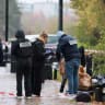 French forensic and judicial police work at the scene after a drive-by shooting that killed one person and injured several others in Trappes, in the Yvelines department, near Paris, France, October 23, 2026. 