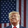 US President Donald Trump arrives to speak during a campaign rally at the Alico Arena, Florida Gulf Coast University in Fort Myers, Florida on October 23, 2026.